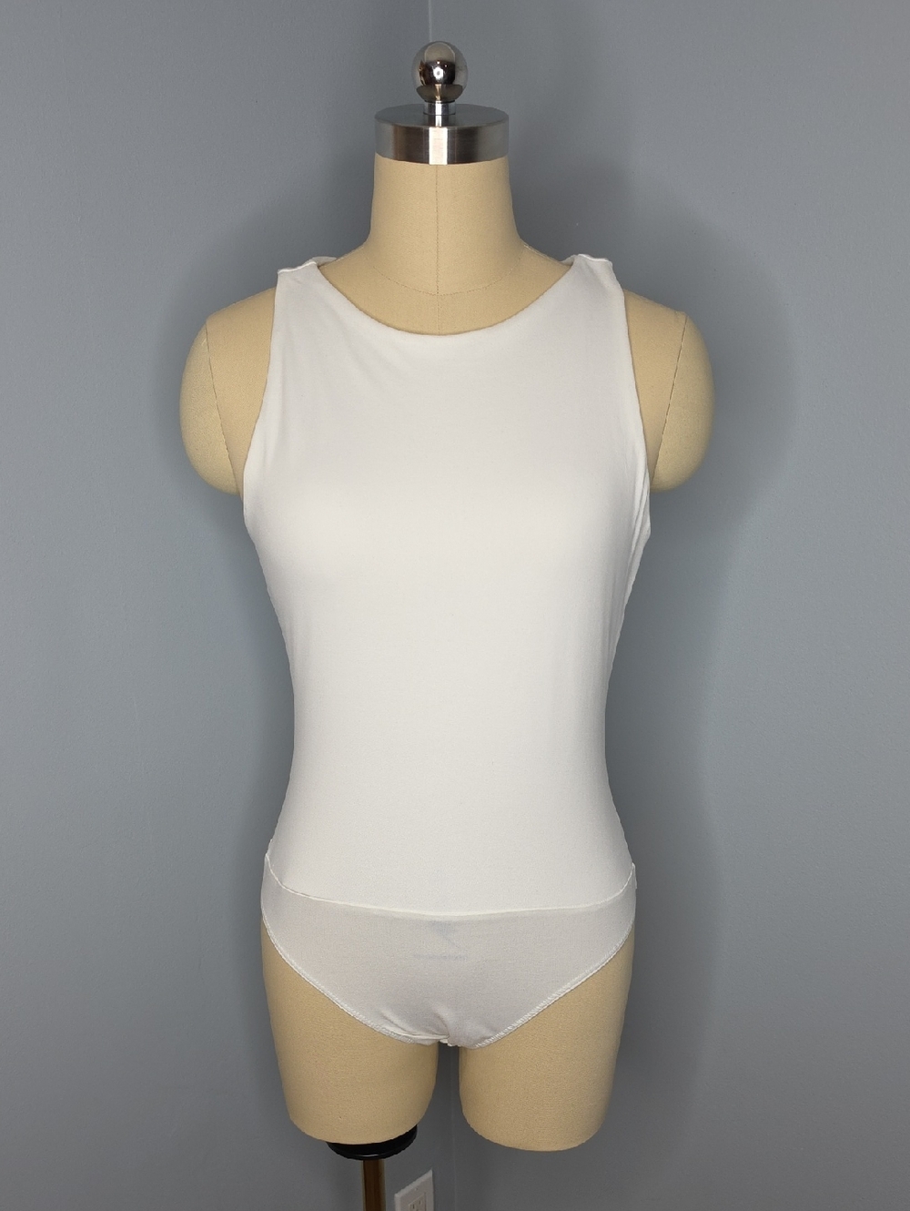 Vici Cream Sleeveless Thong Bodysuit Never Worn. Size medium